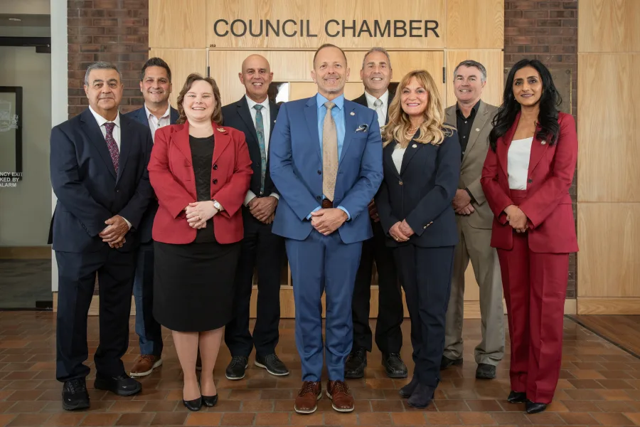 Group photo of Mayor Jim Diodati and eight Councillors